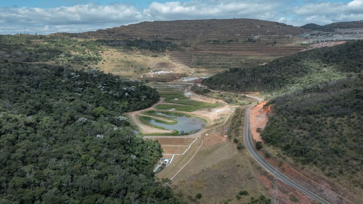 Aerial view of a dirt track surrounded by vegetation